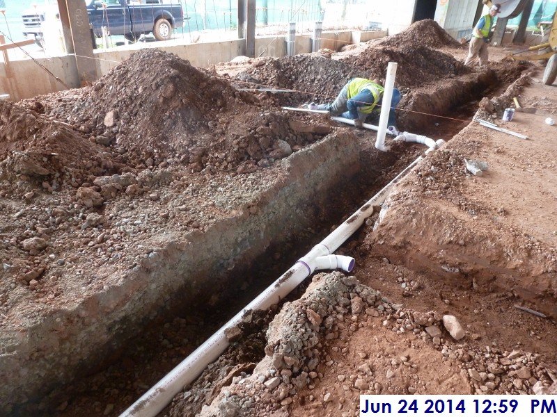 Roughing underground sanitary piping under adult cells Facing West (800x600)